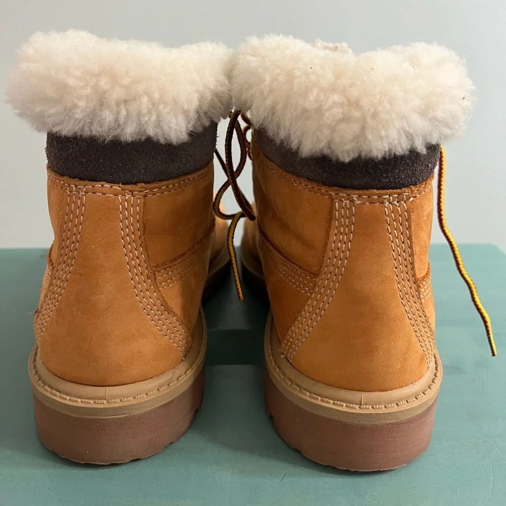 Youth 1.5 Timberland Classic weather resistant laceup boots faux‎ shearling rim